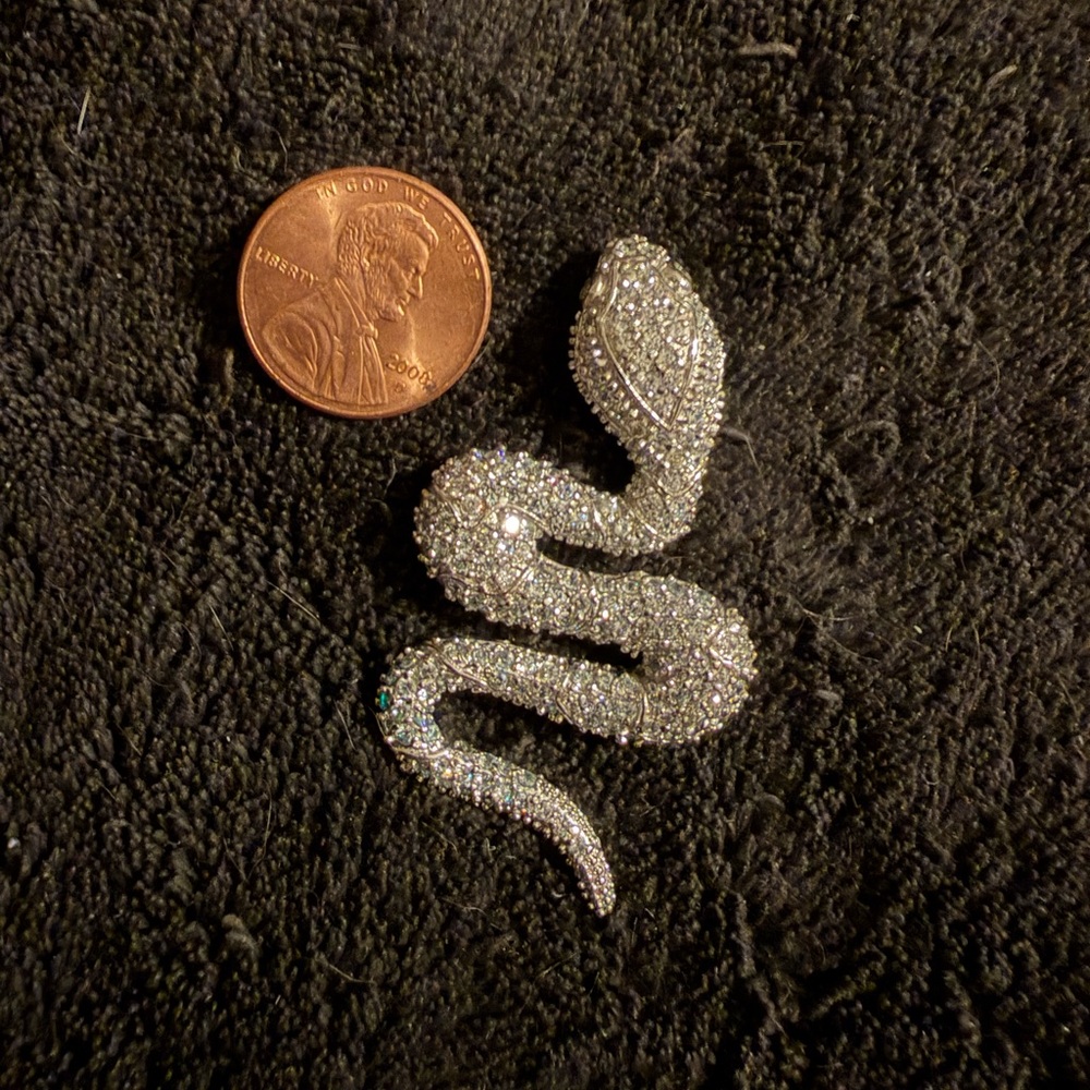 Silver snake pendant w’ CZ’s